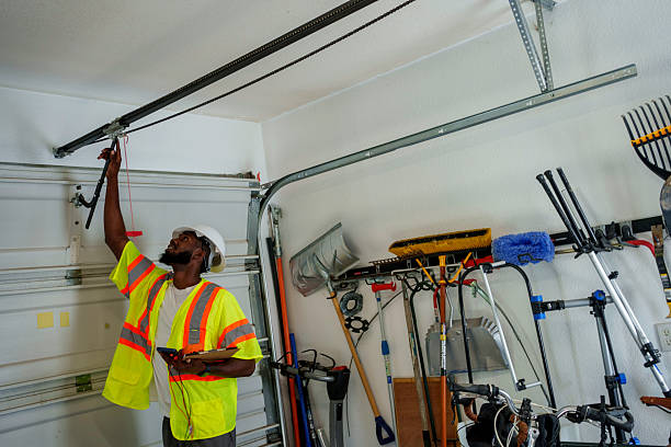 Professional Garage Door Panel Replacement technician working in Bryan County County, OK